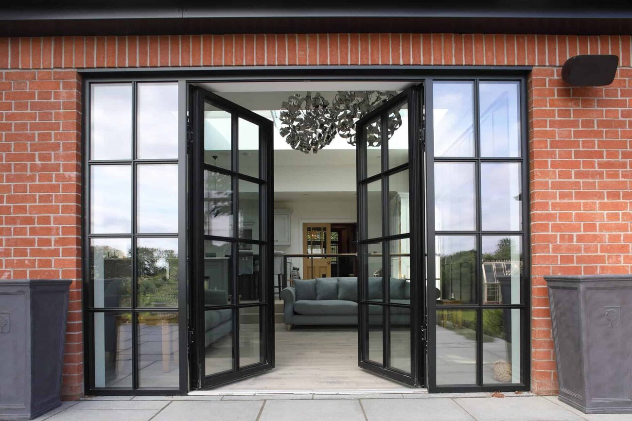 Aluminium French doors opening to a garden