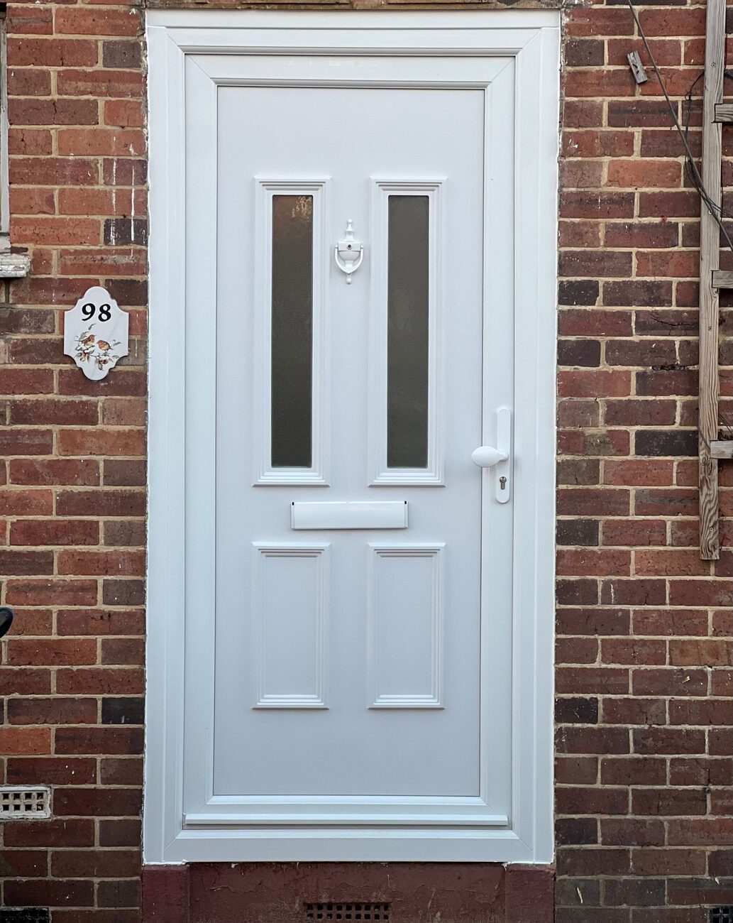 Modern composite front door replacement from Help 2 Buy Windows