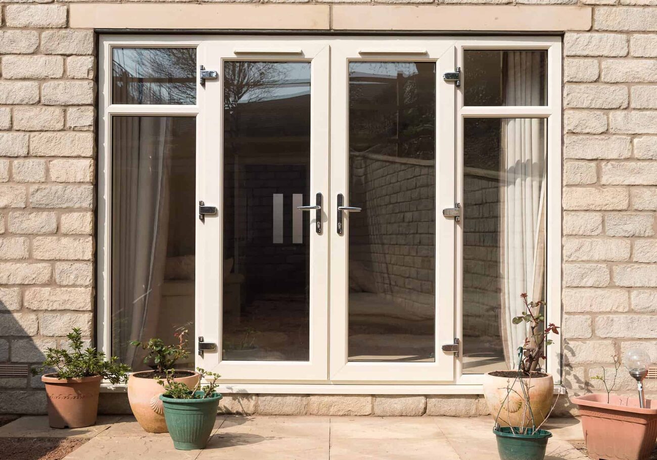 uPVC French doors opening outwards with full-height glass