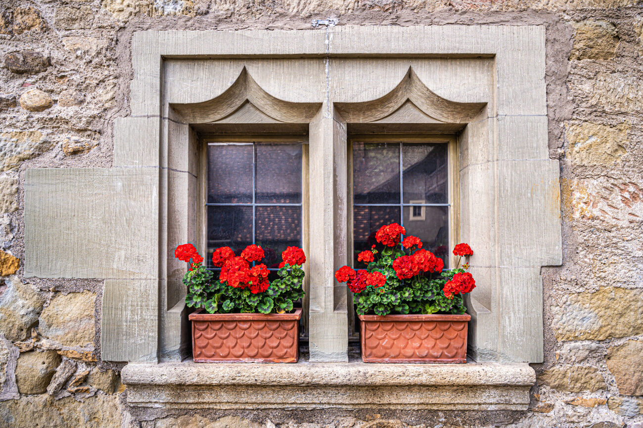 Old medieval-style window in a historic property